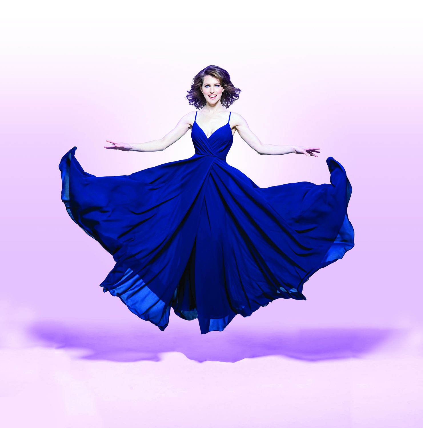 Jen Kramer floating in a flowing blue gown